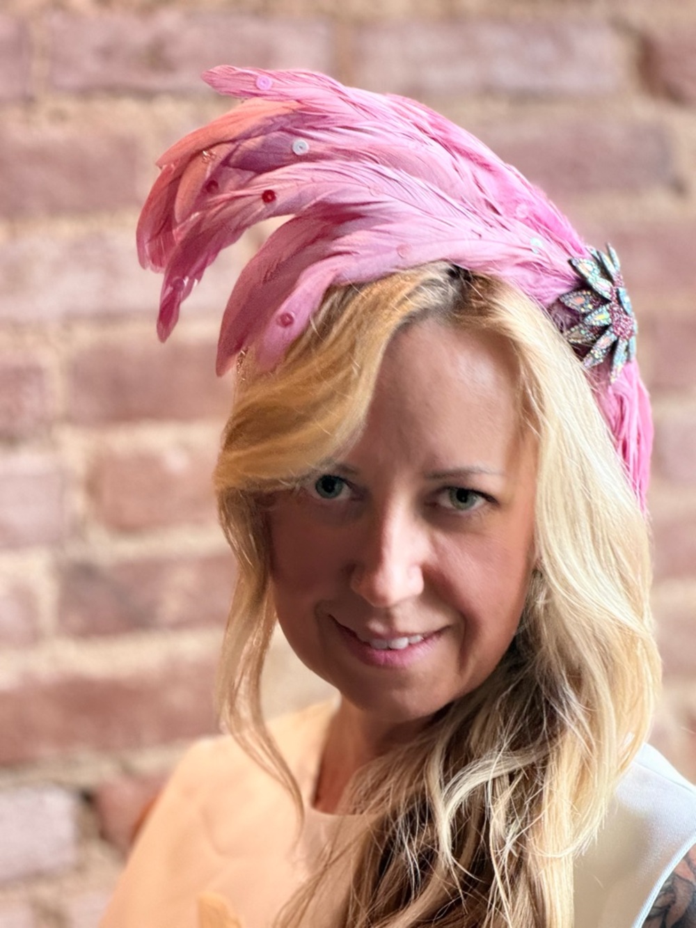 Elegant Pink Feather Side Headpiece with Crystal Brooch.